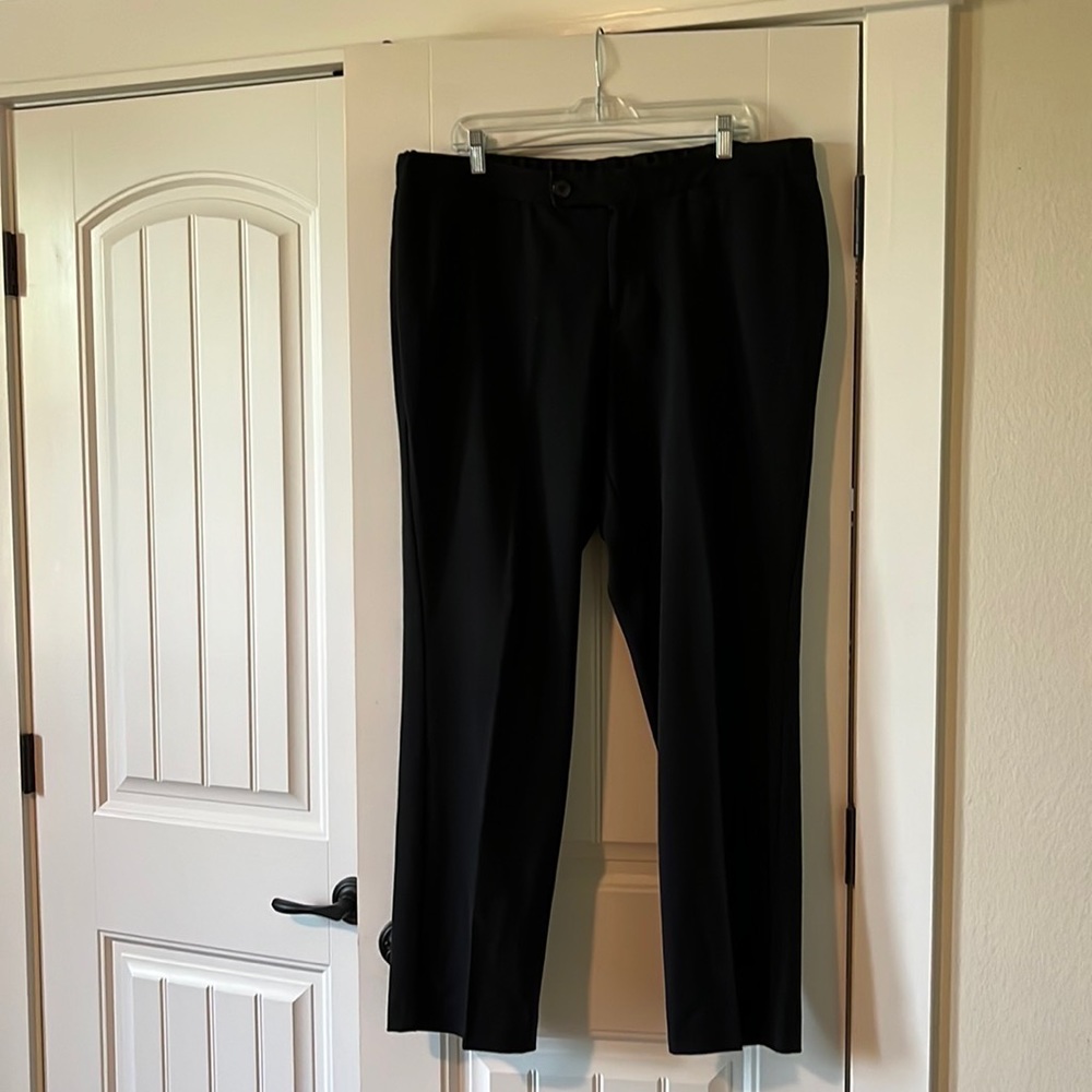 Black, CJBanks,18W, 63% Polyester, 33% Rayon,6% Spandex front zipper.